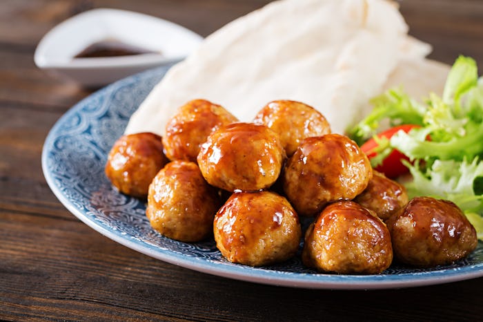 sheet pan sweet and sour meatballs on a plate