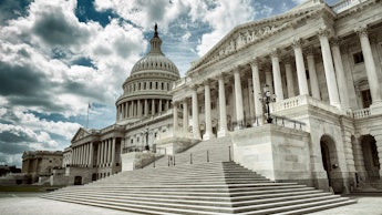 Stark cloudy weather over empty exterior view of the US Capitol Building in Washington DC, USA