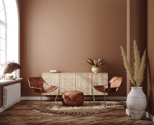 Home interior with ethnic boho decoration, living room in brown warm color, 3d render