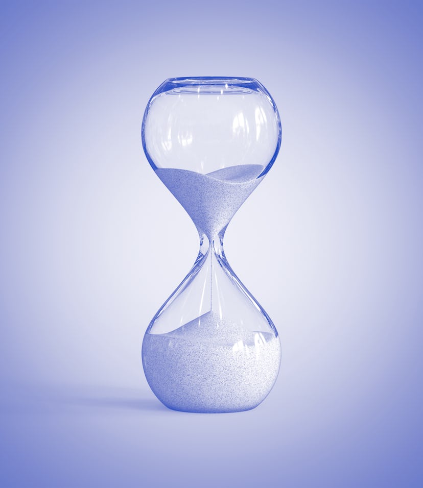 Hourglass on blue background, sandglass 3d rendering