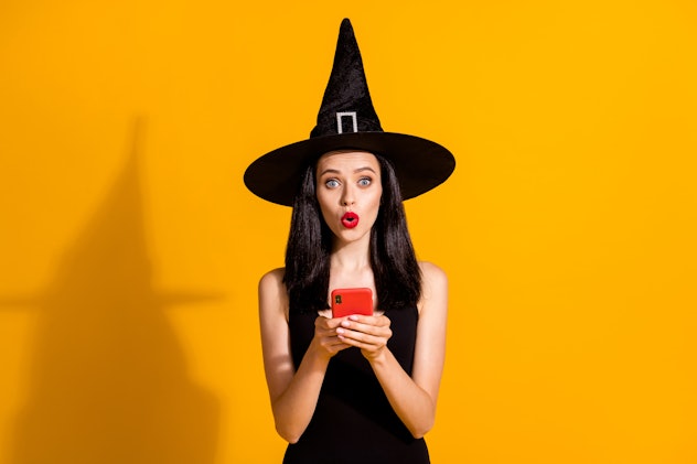 a girl dressed as a witch