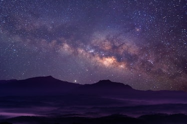 Milky way galaxy at mountain with stars and space dust in the universe, long speed exposure, Night l...