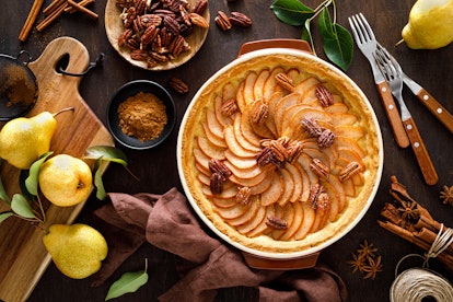 Pear tart with fresh pears, cinnamon and pecan nuts