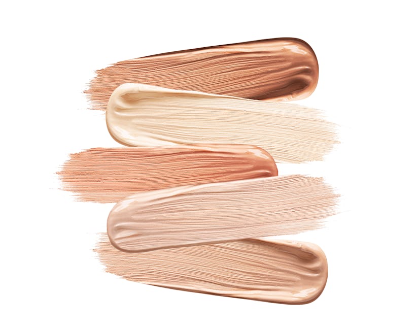 Shades Of Foundation On White Background. Closeup Of Different Tones Of Liquid Foundation, Makeup Pr...