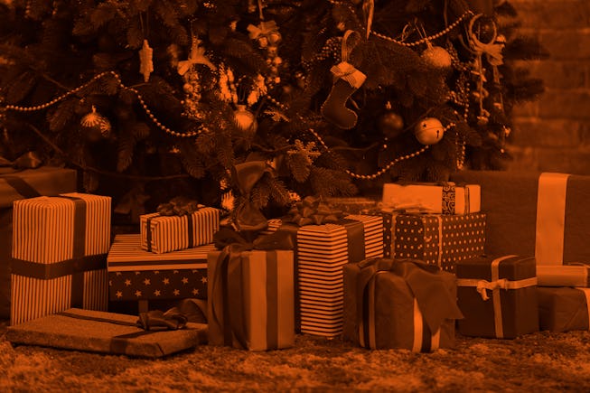 Presents under the Christmas tree on floor