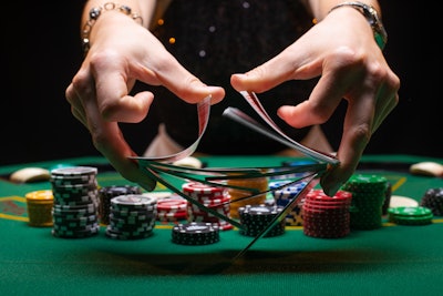Premium AI Image  Poker Showdown Describe the pivotal moment when a  professional poker player takes the ultimate