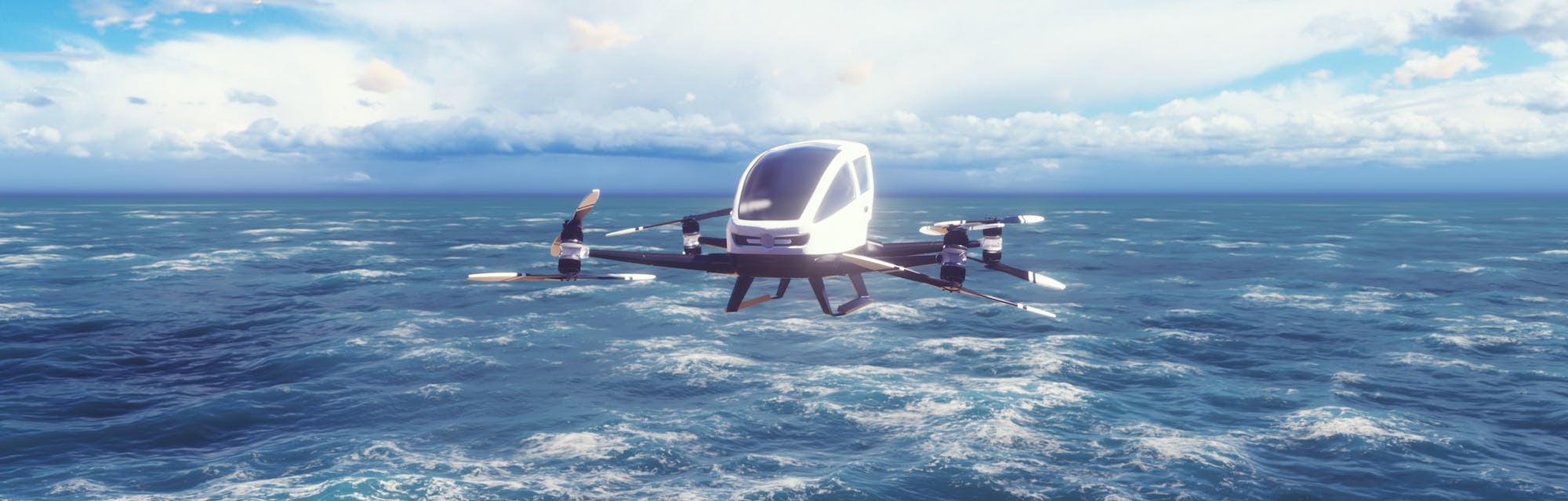 An unmanned passenger air taxi flies over the sea. The concept of the future driverless taxi. 3D Rendering