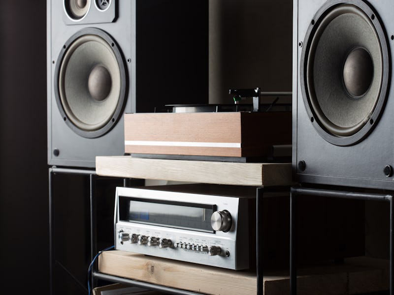 HiFi system with turntable, amplifier and speakers in a studio