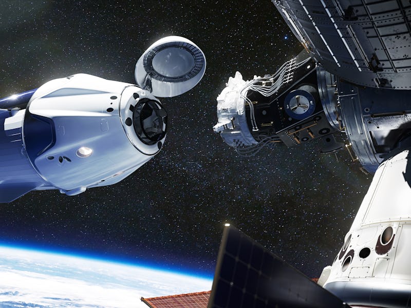 SpaceX Crew Dragon spacecraft docking to the International Space Station. Dragon is capable of carry...