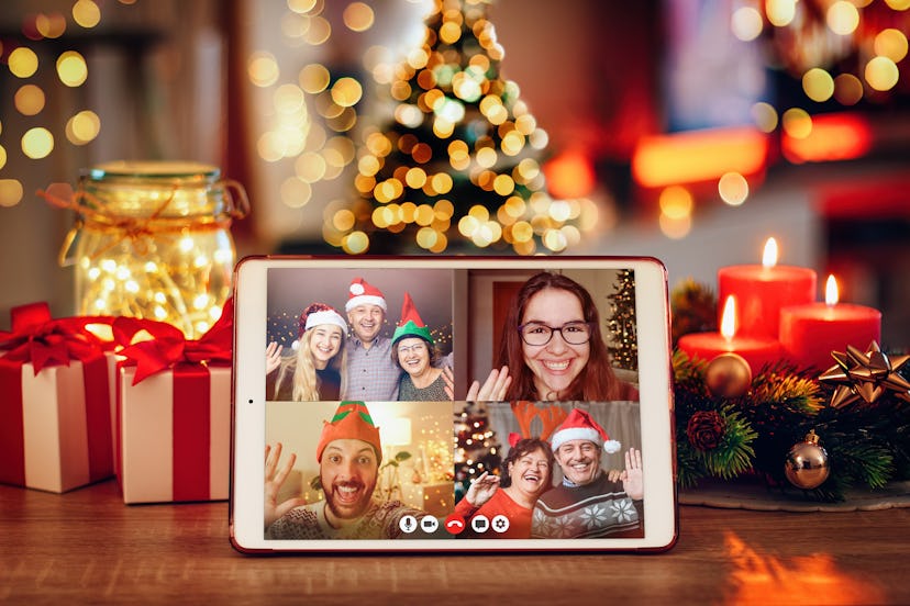 Christmas video call with the family. Concept of families in quarantine during Christmas because of ...