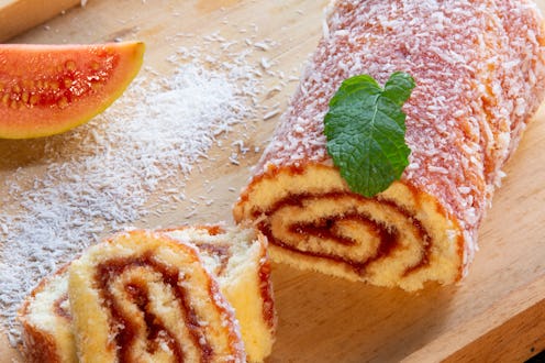 Bolo de Rolo (Swiss roll, Roll cake) typical Brazilian dessert, from the northeast region. Sliced ...