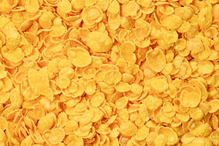 Corn-flakes background and texture. Top view. cornflake cereal box for morning breakfast.