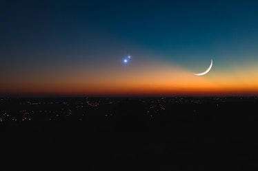 Astronomical conjunction of Saturn, Jupiter and Moon.