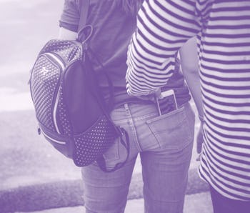 Street thief stealing mobile phone from back pocket of jeans woman., Robber, Thief concept