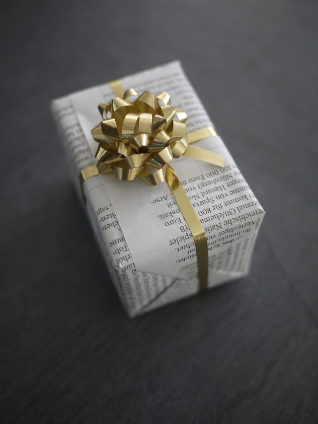 Using newspaper as gift wrap is as classic as it gets.
