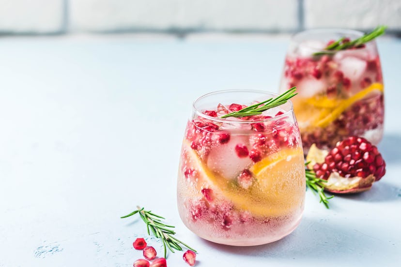 champagne spritzer with pomegranate seeds