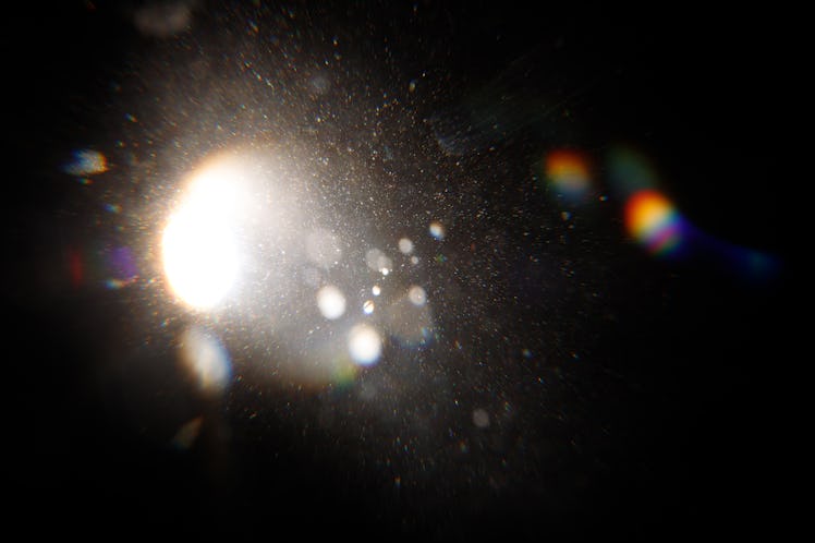 Lens Flare. Light over black background. Easy to add overlay or screen filter over photos. Abstract ...