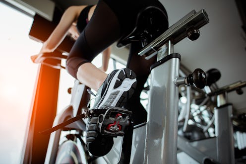 Fitness woman working out on exercise bike at the gym.exercising concept.fitness and healthy lifesty...