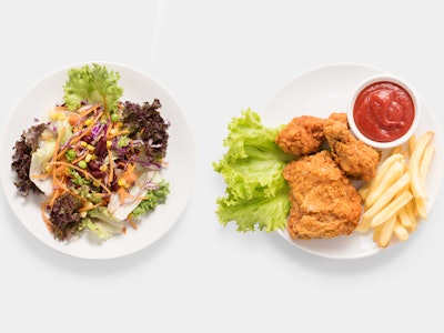 Concept of mock up fresh salad and Fried chicken and french fries set isolated on white background. ...