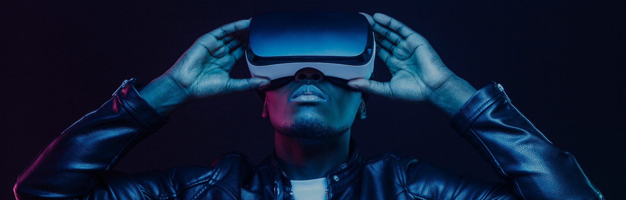 African american man in vr glasses, watching 360 degree video with virtual reality headset isolated ...