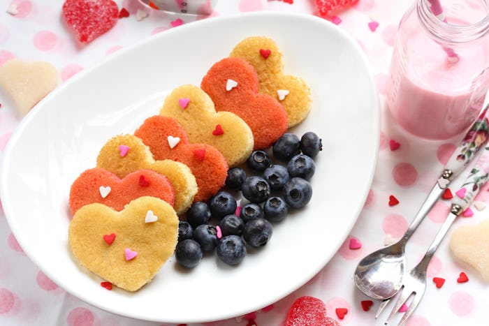 Heart pancakes with strawberry milk / Valentine breakfast concept