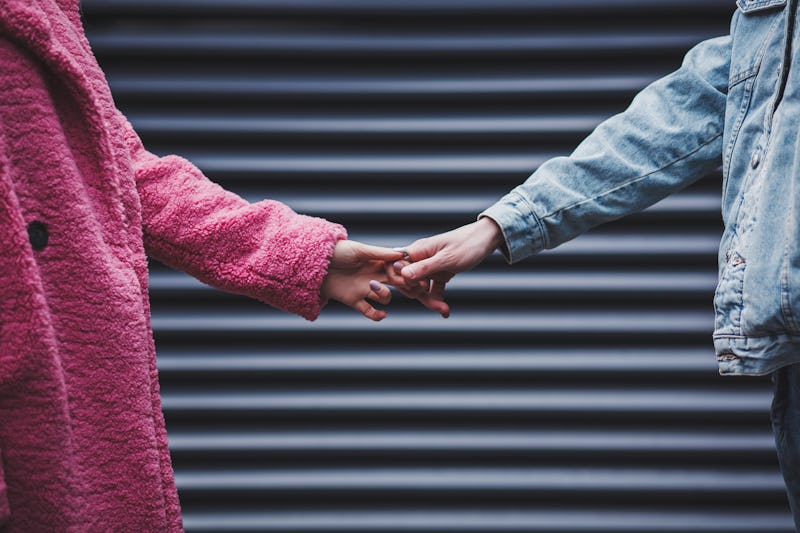 couple holding hands on Valentine's day. concept of love