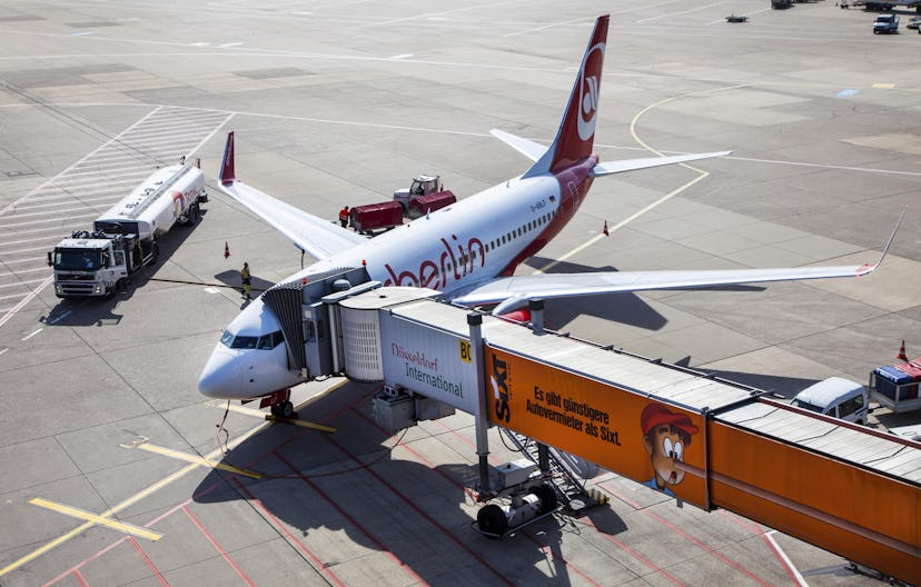 An Air Berlin Boeing 737 at the gate, check-in, loading, unloading, catering, refuelling, baggage lo...