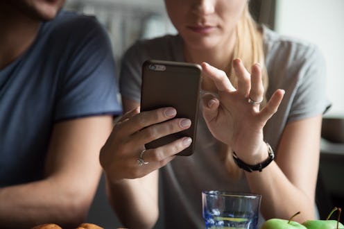 Woman holding mobile phone using smartphone apps concept, couple customers shopping, texting message...