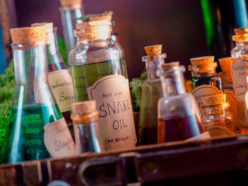 Snake Oil handwritten potion label. Fake remedy, homeopathy, and unscientific medicine concept.
