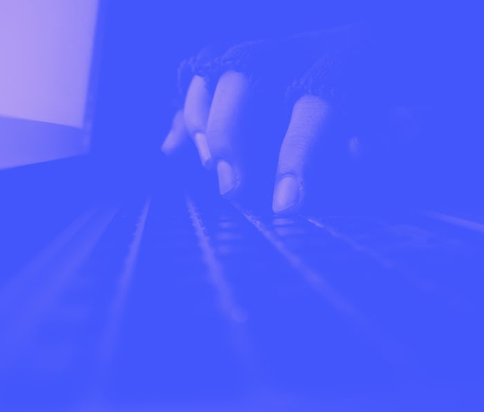 hacker hand stealing data from laptop, cyber crime