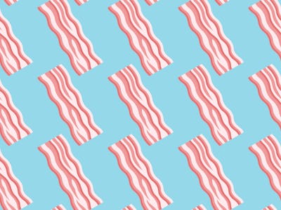 Seamless pattern with bacon strips on blue background. Vector texture.