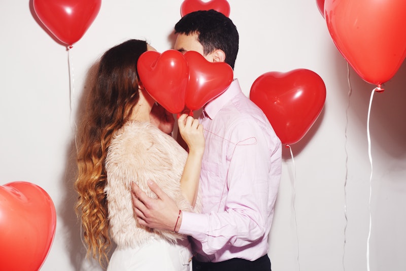 Man with his lovely sweetheart girl dance and have fun at Lover's valentine day. Valentine Couple Pa...