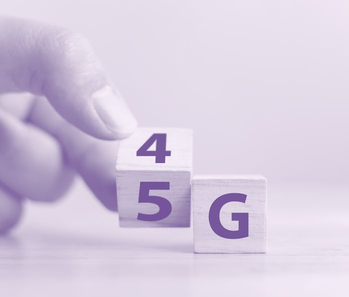 5G (5th Generation) network connecting technology future global. Hand flip wood cube change number 4...