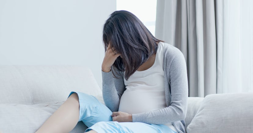 pregnant woman cry and feel depression at home