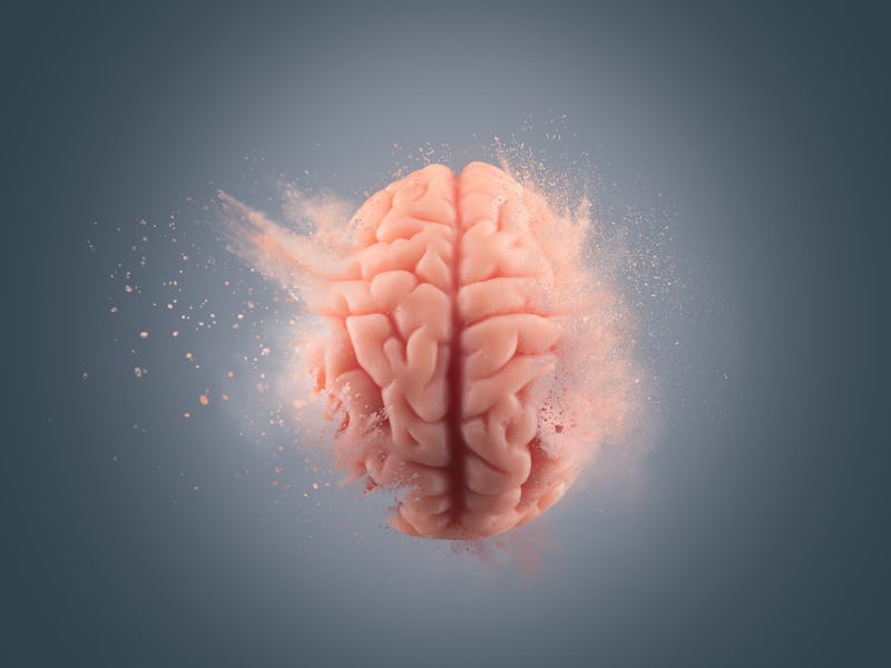 Human brain floating on a gray background. mind blown concept