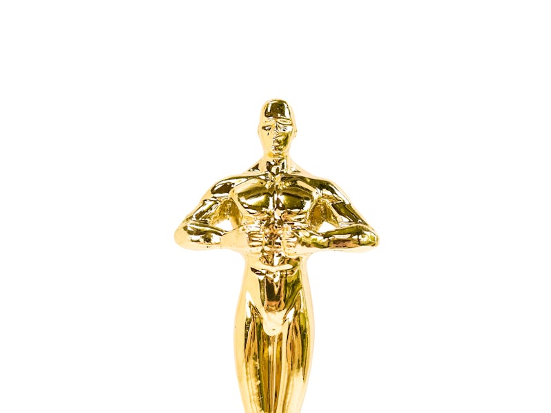 Oscar Golden award or trophy isolated on a white background. Success and victory concept.