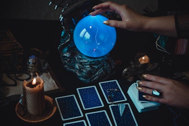 Magic scene, Mystical atmosphere, view of tarot card on the table, esoteric concept, fortune telling...
