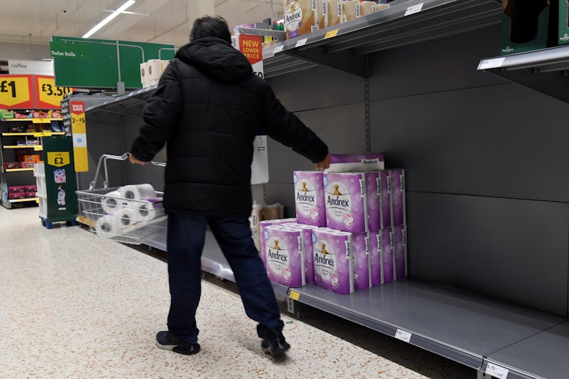 Almost empty toilet paper shelves in Morrisons in Harrow as panic buying continues during the Corona...