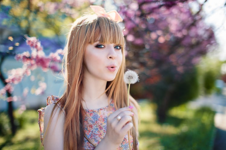 spring, girl near a flowering tree