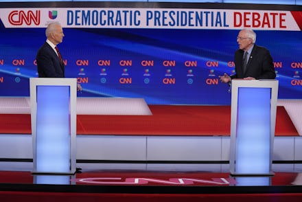 Sen. Bernie Sanders, I-Vt., and former Vice President Joe Biden, participate in a Democratic preside...