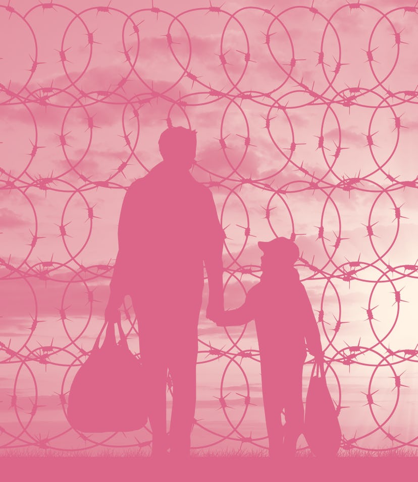 Concept of refugee. Silhouette of a family with a child refugee father near the fence with barbed wi...