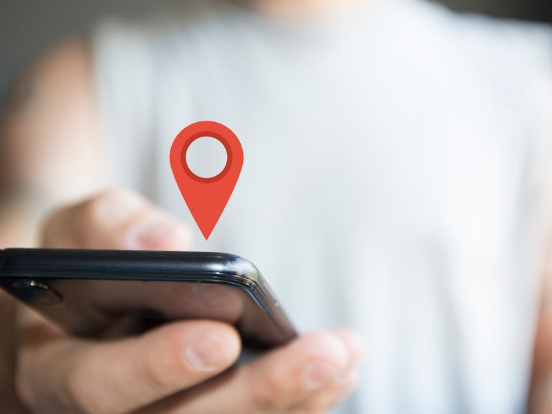 digital composite of person holding phone location icon