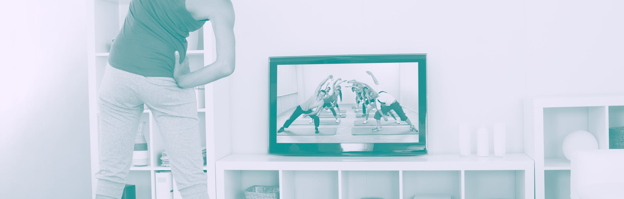 Female Doing Fitness Exercise In Front Of Television