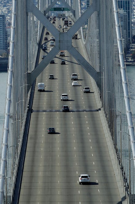 Motorists travel westbound on the San Francisco-Oakland Bay Bridge, in San Francisco. Officials in s...