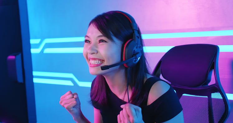 Young Asian Pretty Pro Gamer win in Online Video Game
