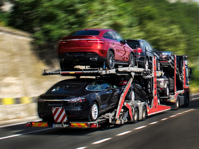 Hauling cars. A car carrier trailer, known variously as a car-carrying trailer, car hauler, auto tra...