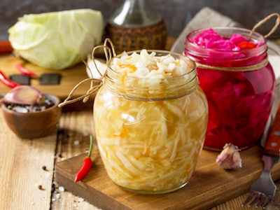 Sauerkraut variety preserving jars. Homemade Sauerkraut with Carrot and Salad Cabbage with Beetroot ...