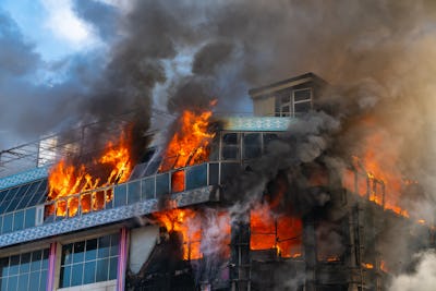 Burning building in thick smoke