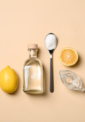 Flat lay composition with vinegar on color background