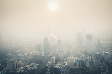 Cityscape of Bangkok the capital cities of Thailand covered by mixture of dust in air pollution, it ...